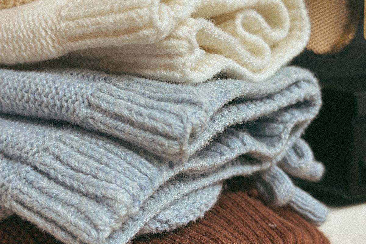 A stack of folded sweaters