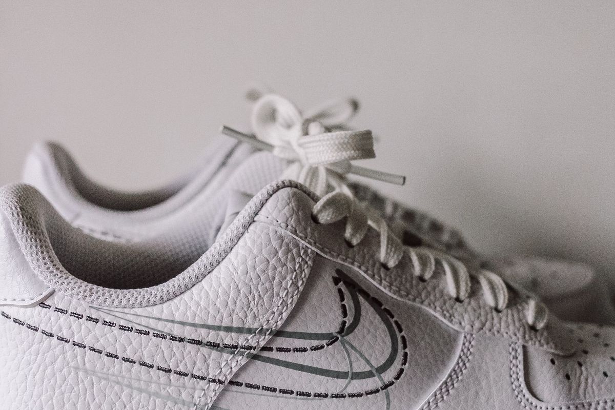 A pair of white sneakers